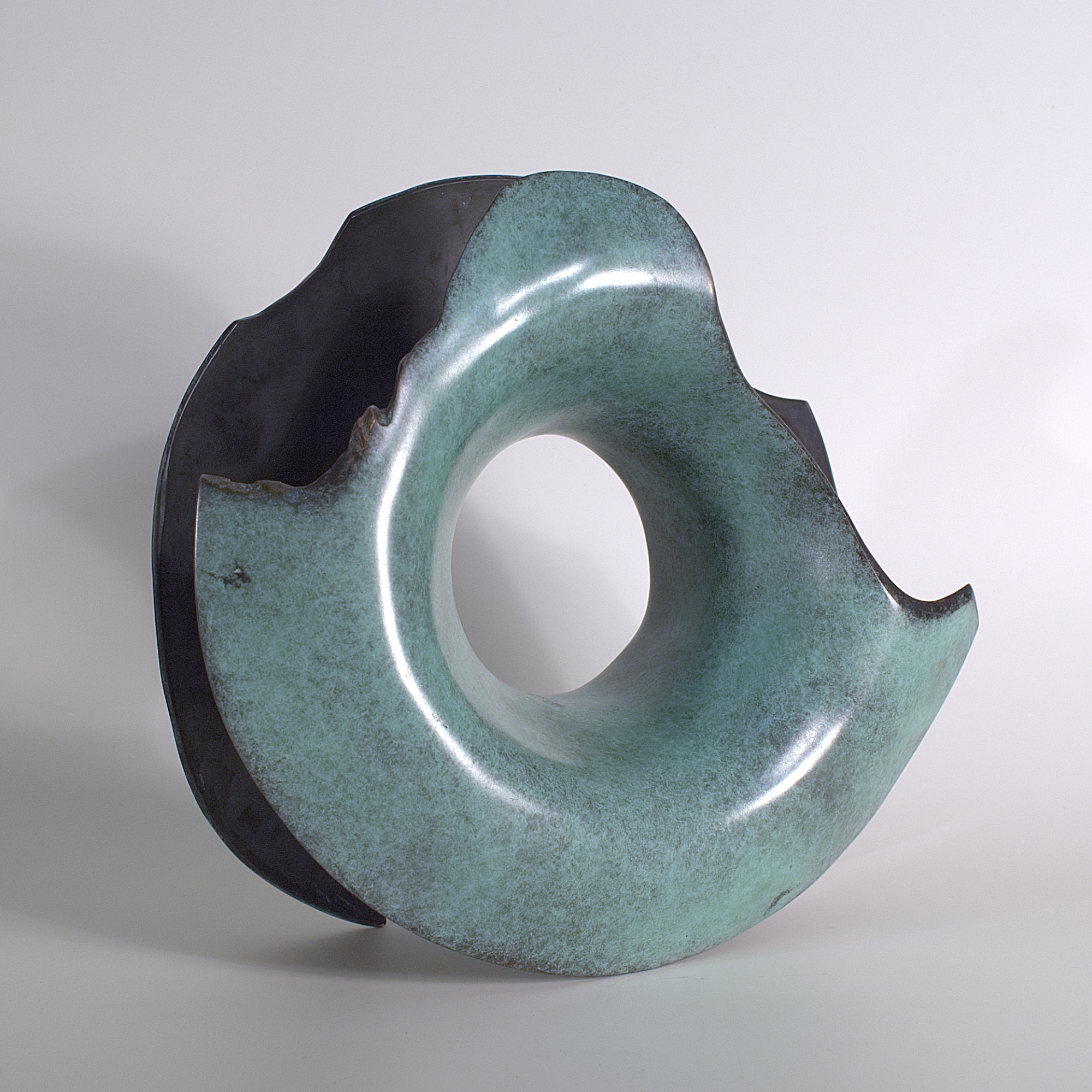 Annular form #1. Modern bronze sculpture by Steve Howlett. 2013