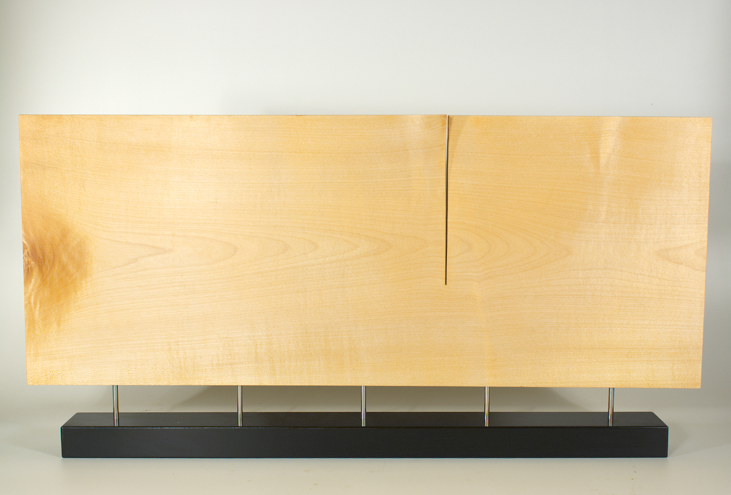 Modern sculpture in wood. Original in sycamore and stainless steel. 