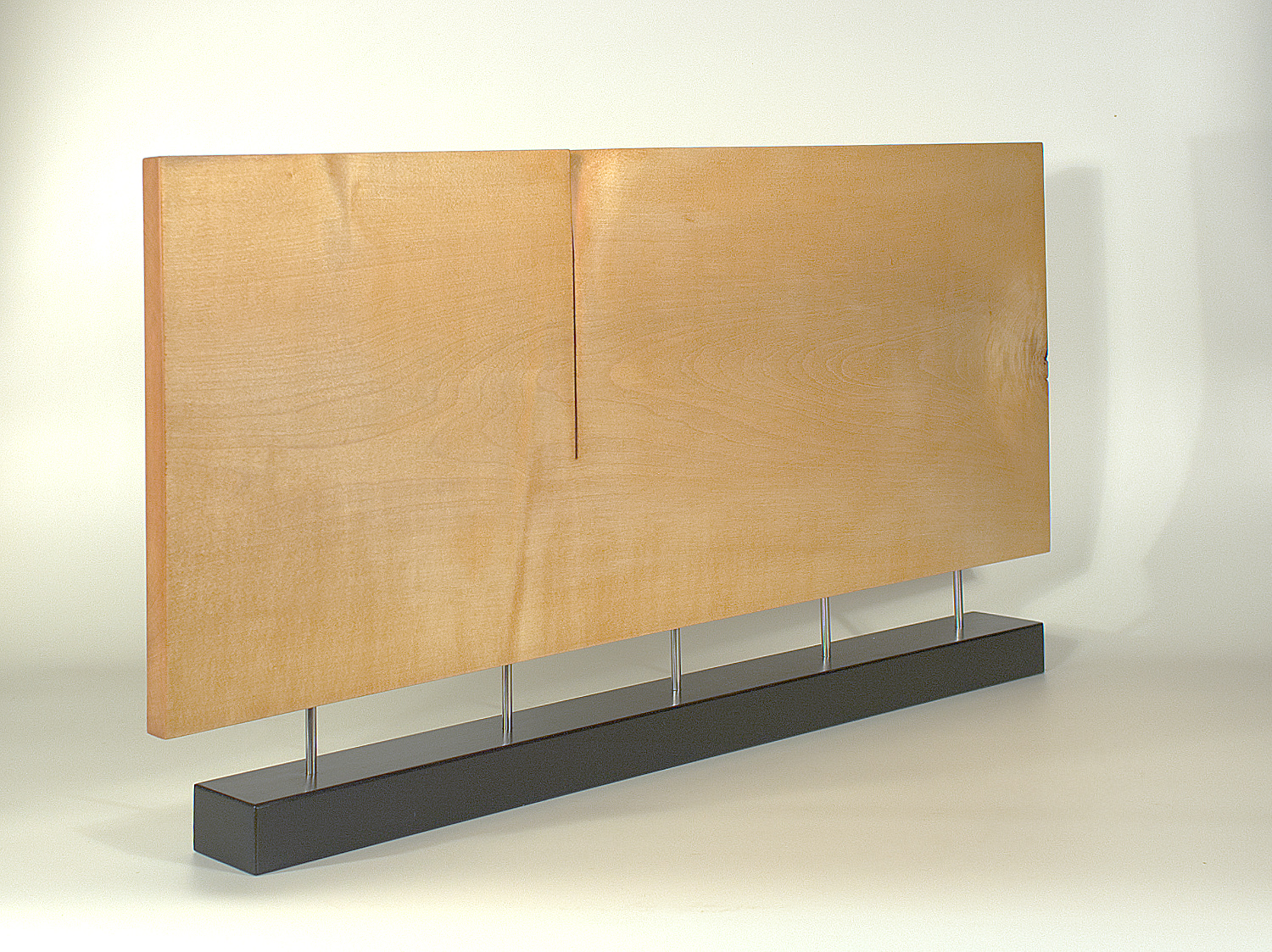 Modern sculpture in wood. Original in sycamore and stainless steel. 