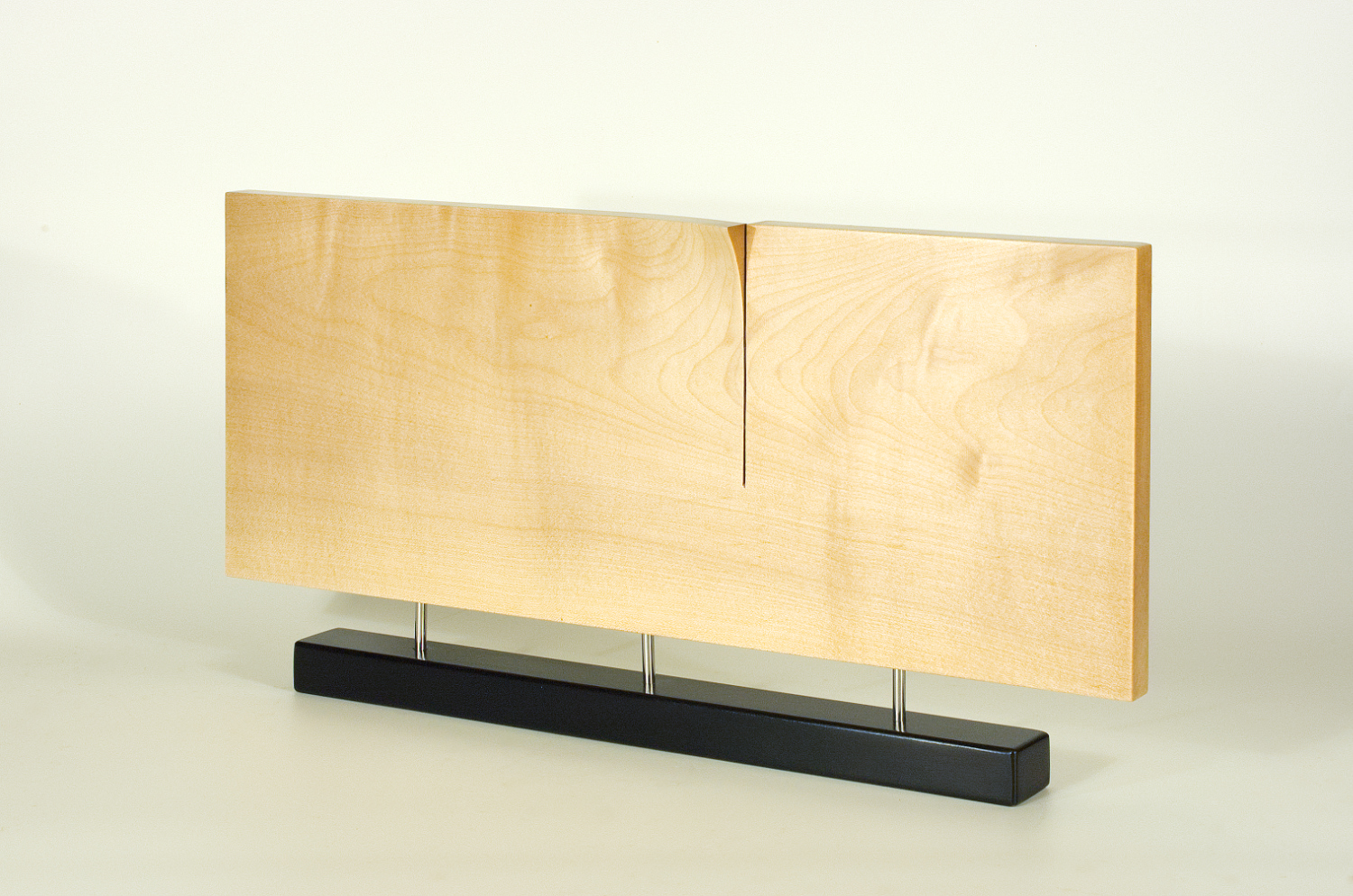 Modern sculpture in wood. Original in sycamore and stainless steel. 
