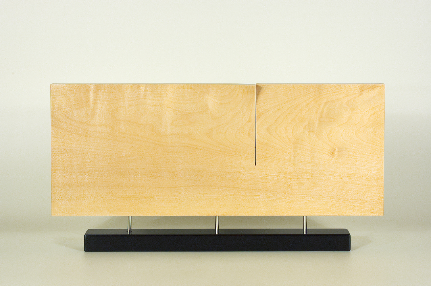 Modern sculpture in wood. Original in sycamore and stainless steel. 