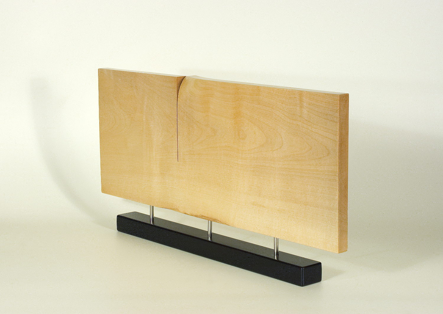 Modern sculpture in wood. Original in sycamore and stainless steel. 