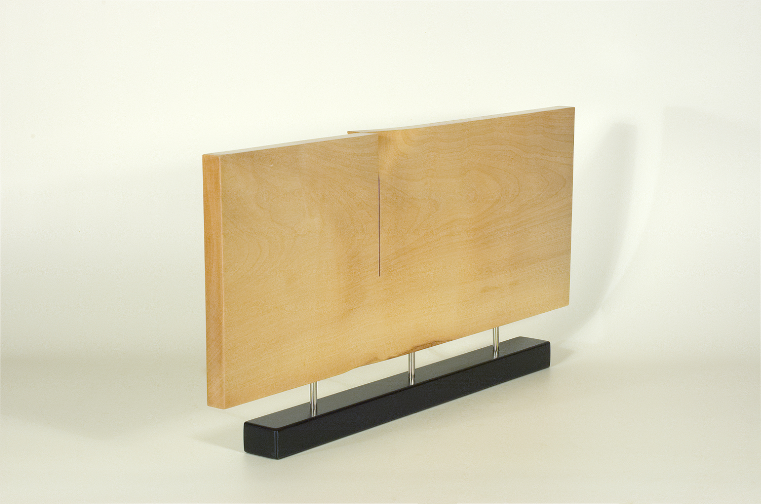 Modern sculpture in wood. Original in sycamore and stainless steel. 