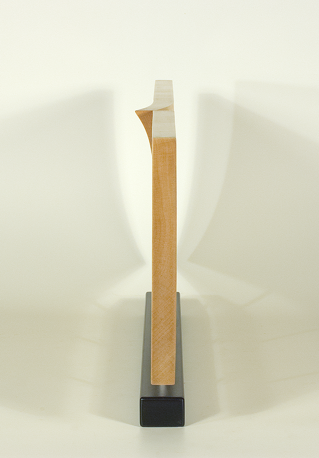 Modern sculpture in wood. Original in sycamore and stainless steel. 